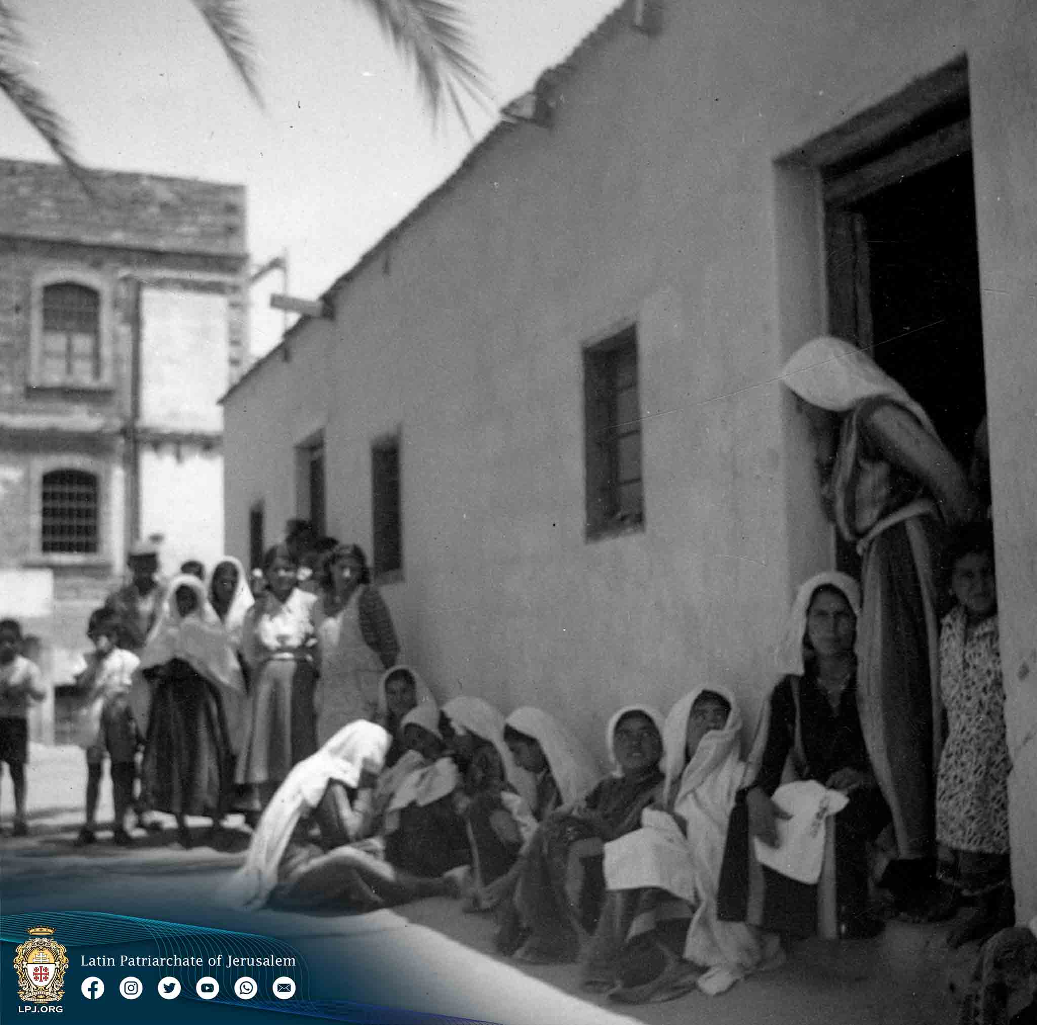 Group of refugees in front of the convent before 1950